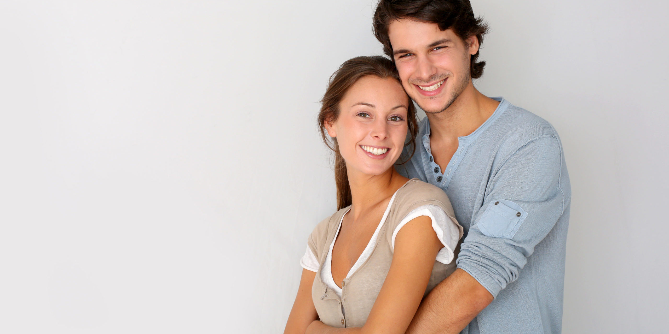Cheerful,Young,Couple,Standing,On,White,Background,,Isolated