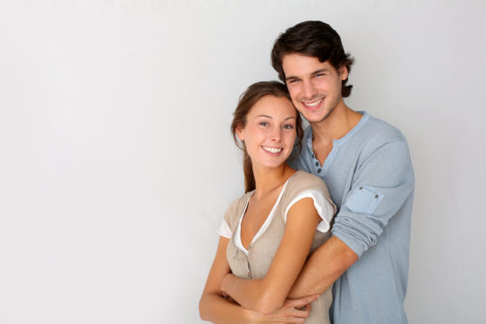 Cheerful,Young,Couple,Standing,On,White,Background,,Isolated